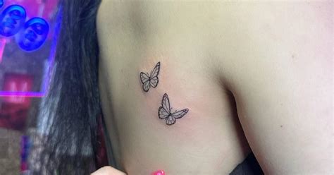 Minimalistic Butterfly Couple Tattoo Placed On The