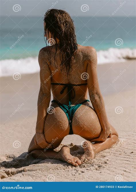 Behind View Of Tanned Woman In Bikini At Sea Beach Stock Image Image