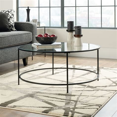 Round Contemporary Coffee Table In Black Mathis Brothers Furniture