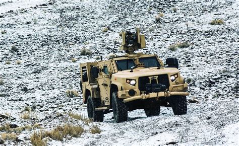 Oshkosh Defense Unveils Silent Drive Hybrid Electric Joint Light Tactical Vehicle Ejltv As Us