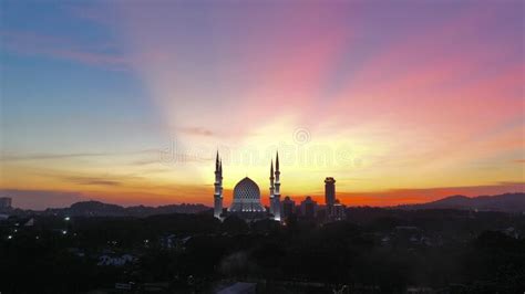 Dramatic Sunset Of Shah Alam Mosque From Aerial View Stock Photo