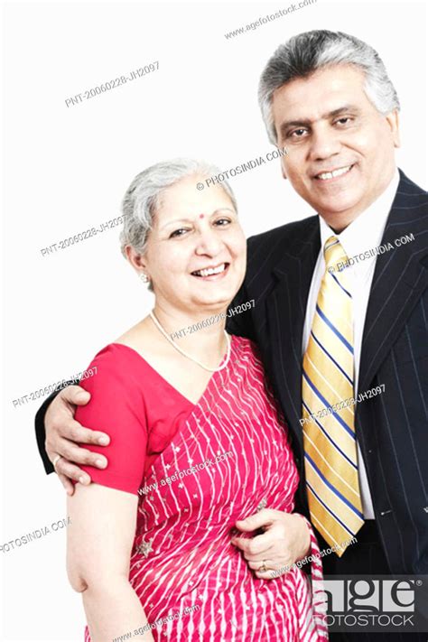 Portrait Of A Mature Woman And Her Son Standing Stock Photo Picture And Royalty Free Image
