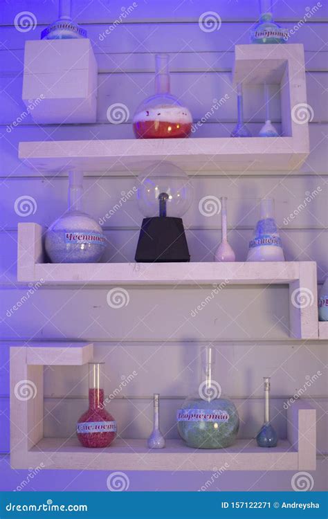 Laboratory Utensils In The Laboratory Shelves With Flasks And Test