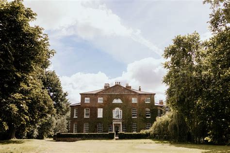 Wootton Hall Estate Wedding With Bright Flowers And Steel Drum Band