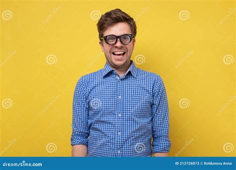 A Man In A Blue Shirt In Several Glasses Smiling Stock Image Image