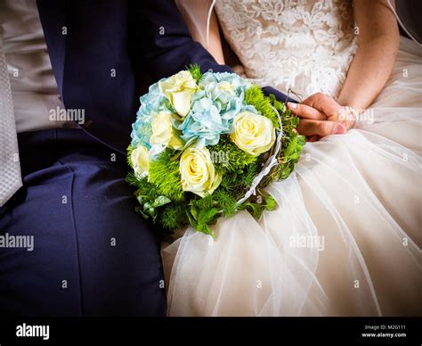 the bridal bouquet with white and blue roses Stock Photo - Alamy