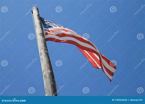 American Flag Flying From Old Pole Key West Stock Photo Image Of Flag