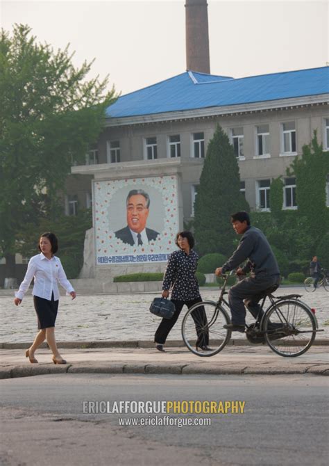 Eric Lafforgue Photography North Korean People Passing In Front Of A