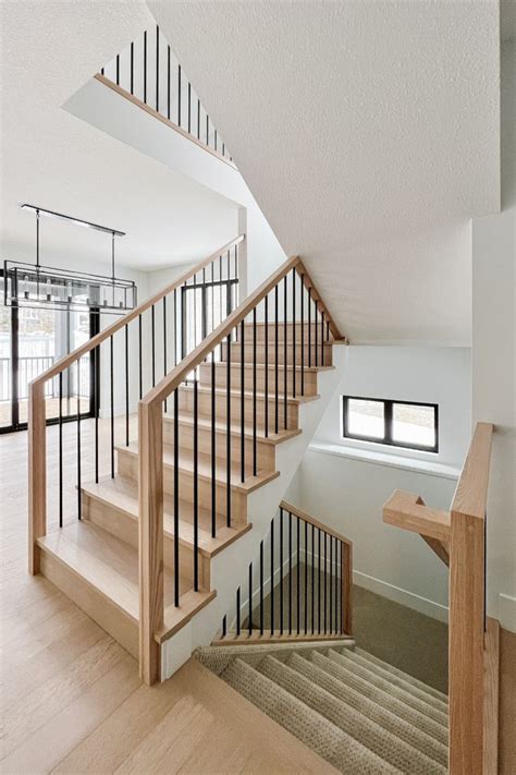 Captivating Stair Railing With A Combination Of Natural Wood And Black