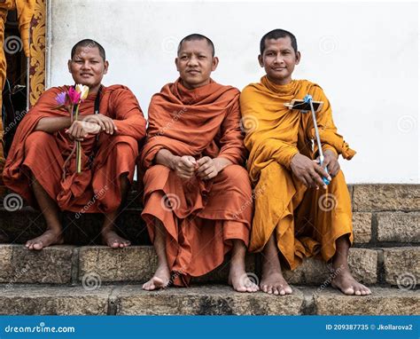 Dambulla Sri Lanka March Three Buddhist Monks With Flowers