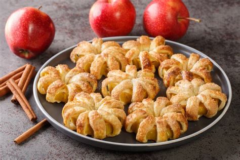 Baked Apples Wrapped In Puff Pastry And Sprinkled With Sugar And