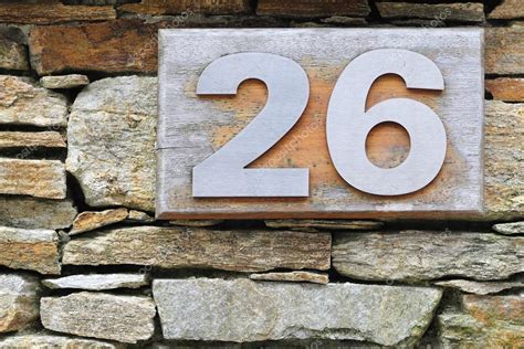Nummer 26 Stahl eingebettet in Holz — Stockfoto © avarand #38962897