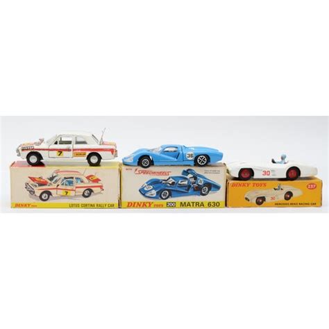 Dinky Toys A Boxed Dinky Lotus Cortina Rally Car Together With A