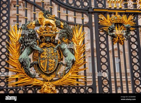 The Royal Coat Of Arms On The Wrought Iron Gates Of The Buckingham