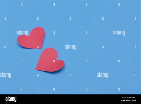 Red Paper Broken Heart On Blue Background Stock Photo Alamy