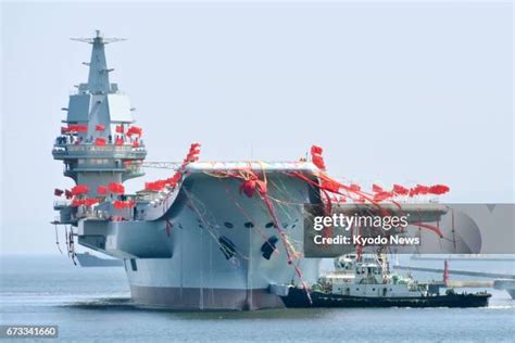 11 China Launches First Domestically Built Aircraft Carrier Stock