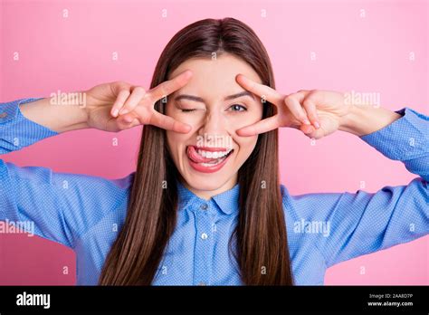 Close Up Photo Of Pretty Lady Showing V Sign Symbols Near Eyes Winking