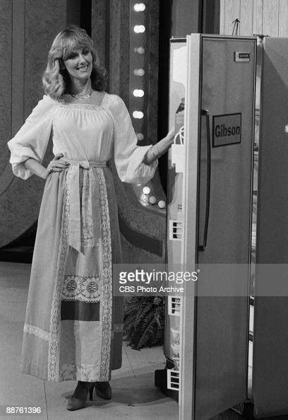 Model Janice Pennington Shows Off One Of The Prizes A Refrigerator