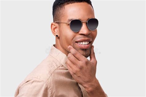 Closeup Portrait Of Stylish African American Man Looking Through Posing