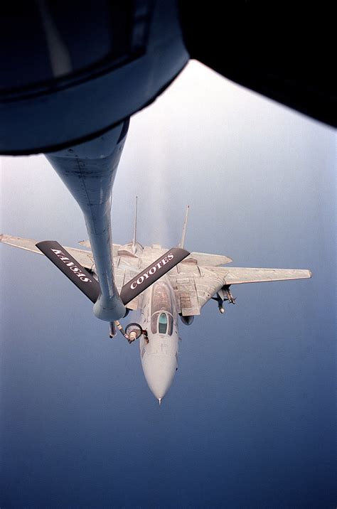 An F A Tomcat Aircraft From Fighter Squadron Vf Is Refueled