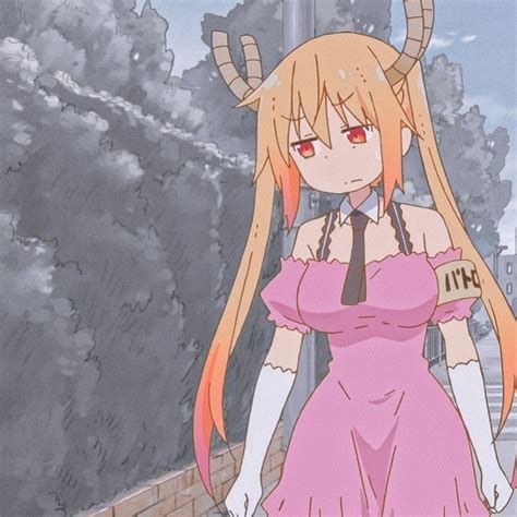 An Anime Character In A Pink Dress With Horns On Her Head And Hands