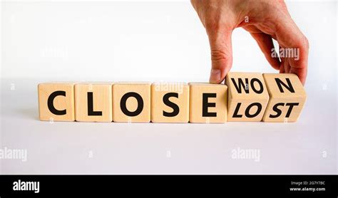 Close Won Or Lost Symbol Businessman Turns Wooden Cubes And Changes