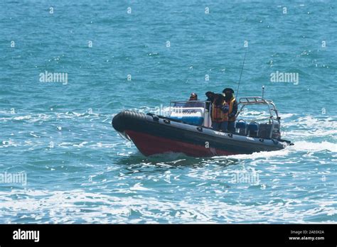 South African Police Dive Unit In An Inflatable Rubber Dingy Boat