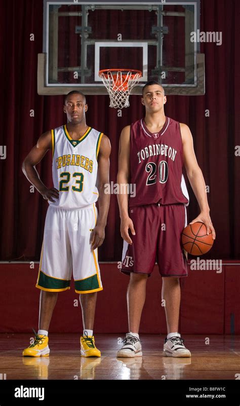 Two High school basketball players, both nearly seven feet tall, in ...