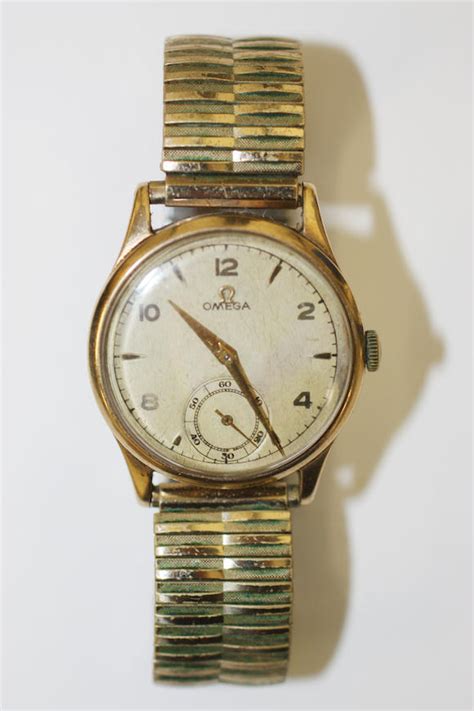 Bonhams Omega A 9ct Gold Gentlemans Watch Head