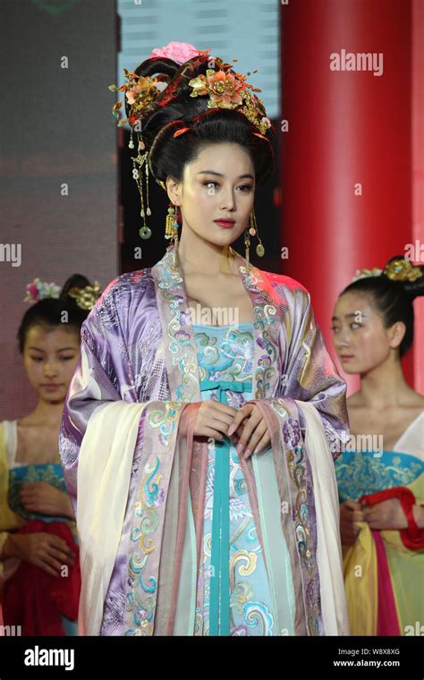 Chinese actress Zhang Xinyu, front, dressed in ancient Chinese costume ...