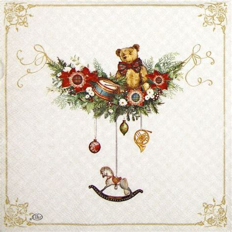 A Christmas Card With A Teddy Bear Hanging From It S Side And Ornaments