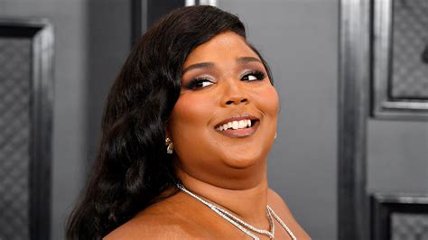 Lizzo Calls Out Body-Shamers in a New Workout Video | Allure