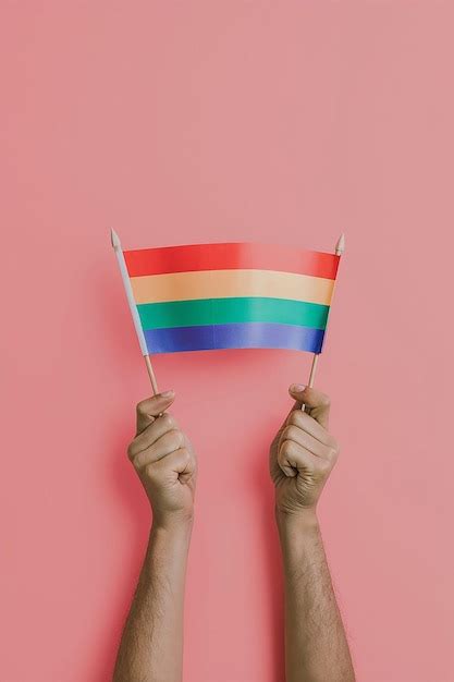 Hands Holding A Pride Flag Premium Ai Generated Image