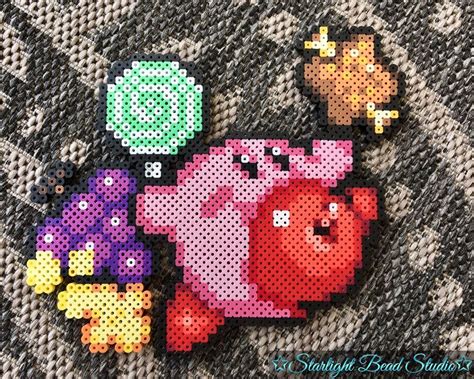 𝕋𝕪𝕝𝕖𝕣 & 𝔸𝕤𝕙𝕝𝕖𝕪 on Instagram: “Kirby 🍎🍇🍖🍿🍭 #kirby #perlerbeads #art # ...