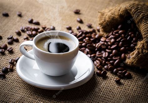 Premium Photo | Coffee in a cup and saucer