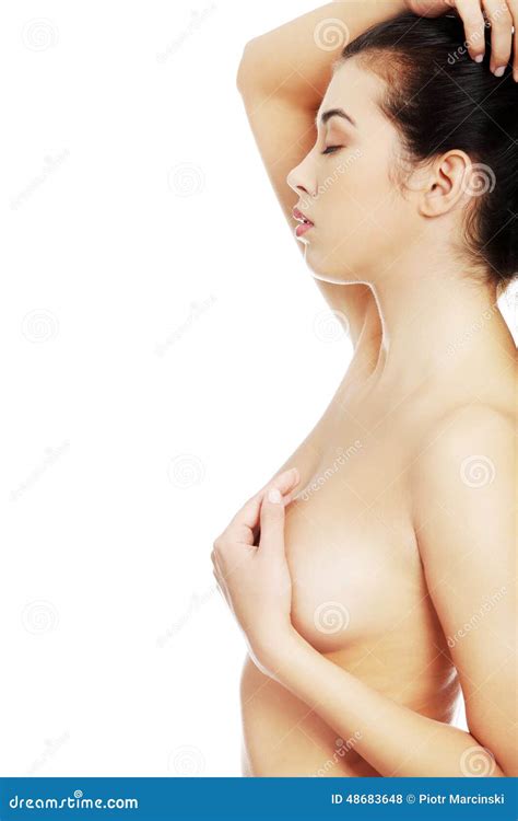 Side View Of Nude Woman Touching Her Breast Stock Photo Image Of