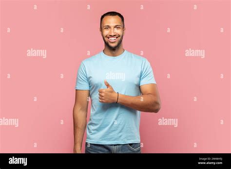 Happy African American Man Showing Thumb Up And Cheerfully Smiling At