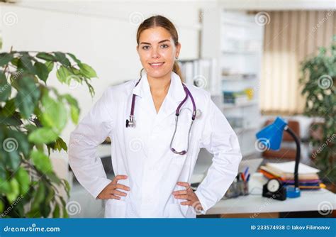 Female Doctor Standing In Hall Of Clinic Stock Photo Image Of Russian