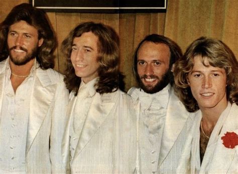 Barry Robin And Maurice Gibb Of The Bee Gees With Their Brother Andy