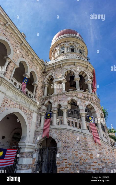 Kuala Lumpur, Malaysian National Flag (Jalur Gemilang) at Clock tower of Sultan Abdul Samad ...