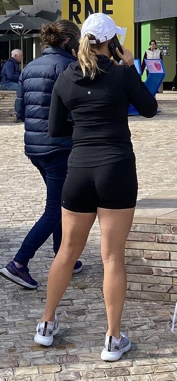 Blonde Milf In Black Lulus Showing Off Her Toned Ass And Thighs Short
