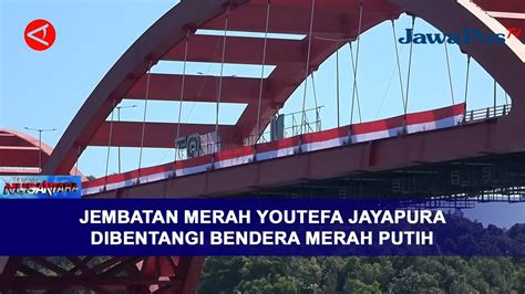 JEMBATAN MERAH YOUTEFA JAYAPURA DIBENTANGI BENDERA MERAH PUTIH