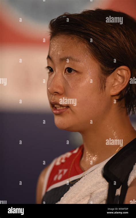 Nozomi Okuhara Of Japan Competes Against Pornpawee Chochuwong Of