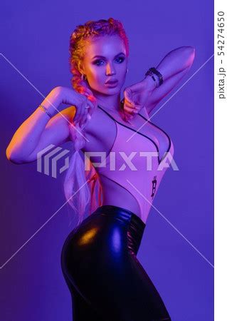 Sexy Hot Blonde In Leggings And Top Posing Pixta