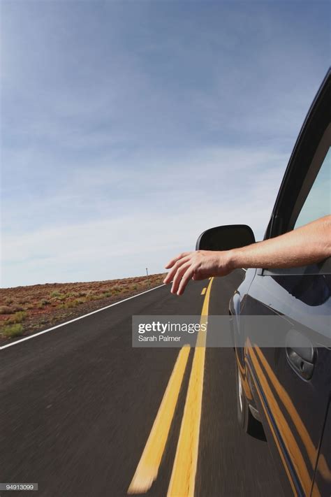 One hand out the car window on an empty highway in Arizona, USA | Window photography, Car window ...