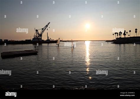 Oceanside beach at sunset Stock Photo - Alamy