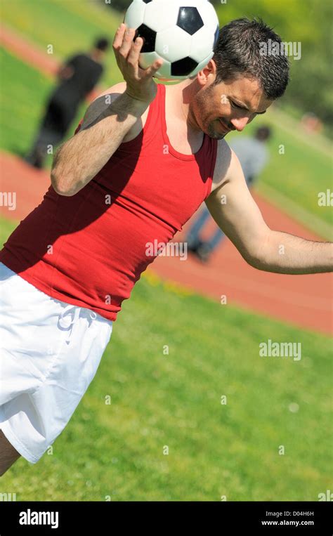 Attractive Football Player With Black And White Balloon Stock Photo Alamy