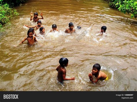 Kids Bathing In River