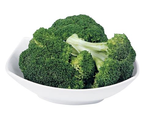 Broccoli Crowns In A White Bowl With A White Background Prepared Food