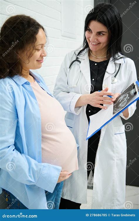 Pregnant Woman Visit Gynecologist Obstetrician Doctor At Maternity